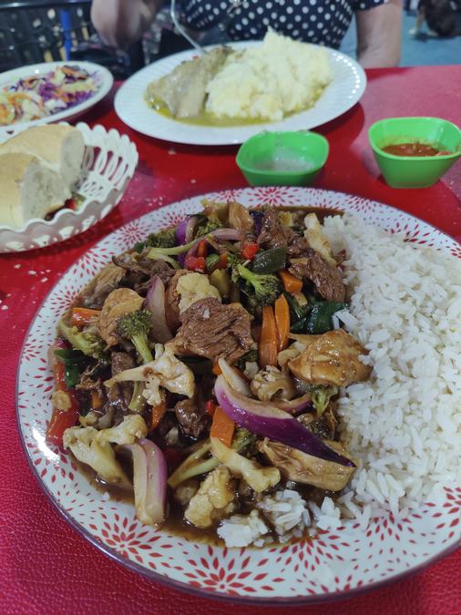 Rice and stir-fry dish at La Vega Central, Santiago.