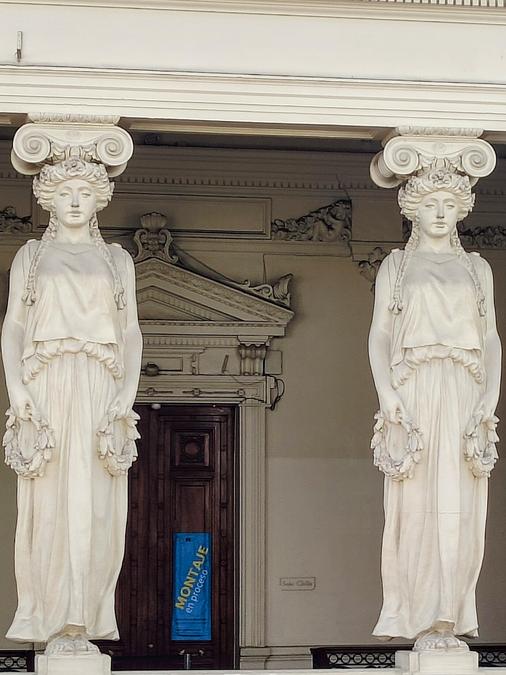 Twin female sculpture pillars.