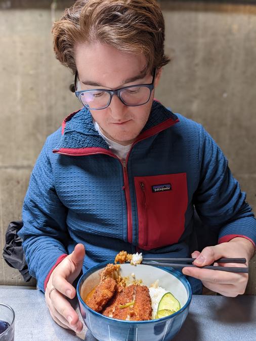 Me digging into the Curry Pork Katsu at Marusan.