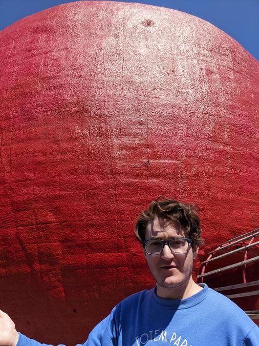 Me posing confusedly in front of The Big Apple.