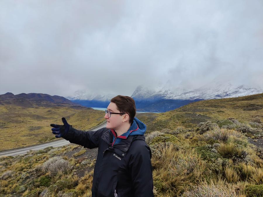 Me gesturing at the mountainous beauty that surrounds us.